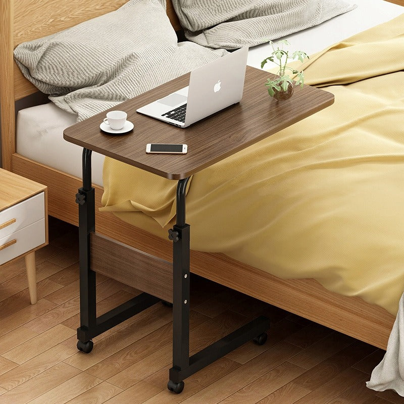 Table pour ordinateur portable sur roulettes, mobile et réglable en hauteur.
