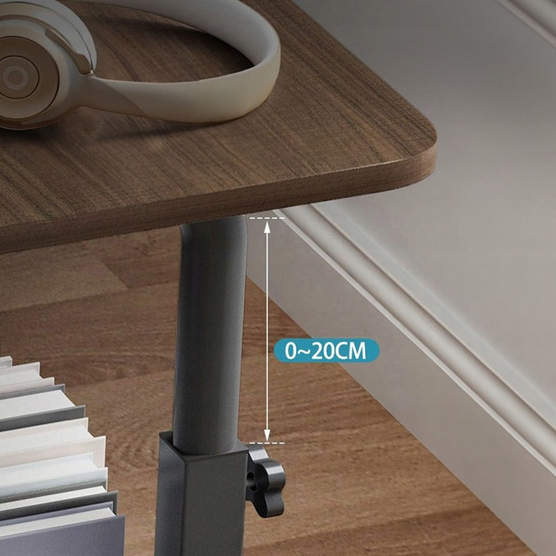 Table pour ordinateur portable sur roulettes, mobile et réglable en hauteur.