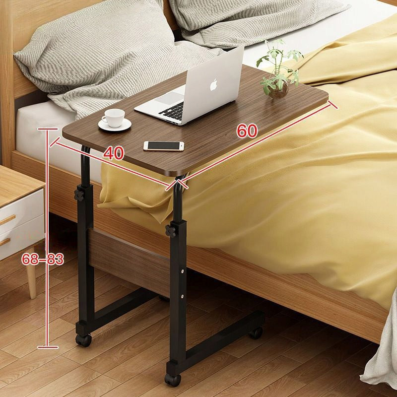 Table pour ordinateur portable sur roulettes, mobile et réglable en hauteur.