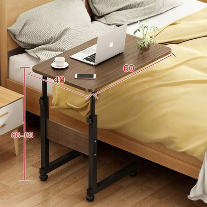 Table pour ordinateur portable sur roulettes, mobile et réglable en hauteur.